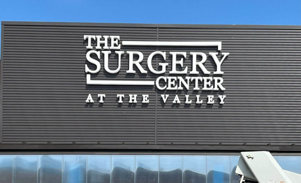 Surgery Center building sign with white lettering on black background