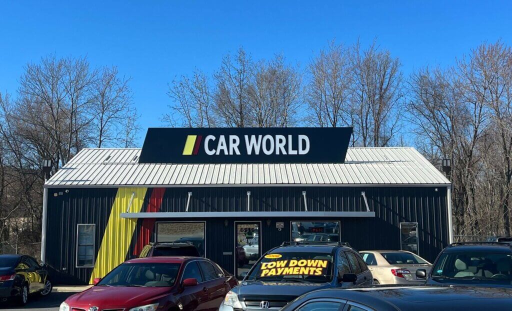 carworld building sign